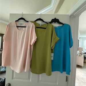 Tops women’s. All New with tags. XL BLUE SOL